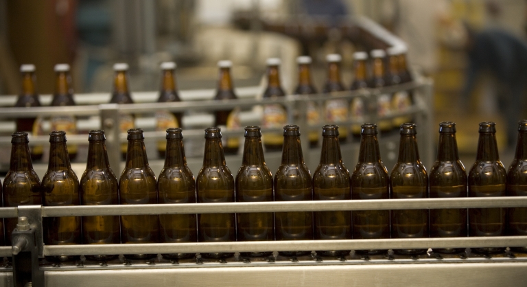 Beer Bottles on a conveyer belt.