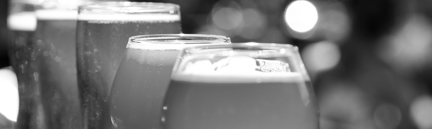 Close-up of various glasses of craft beer.