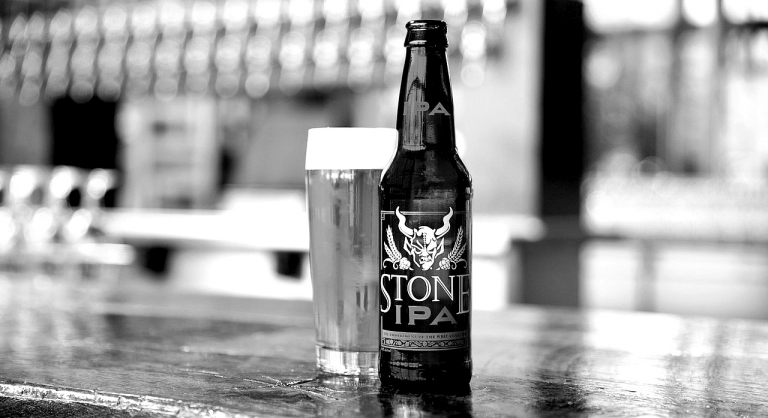 Glass of Stone Brewing IPA.