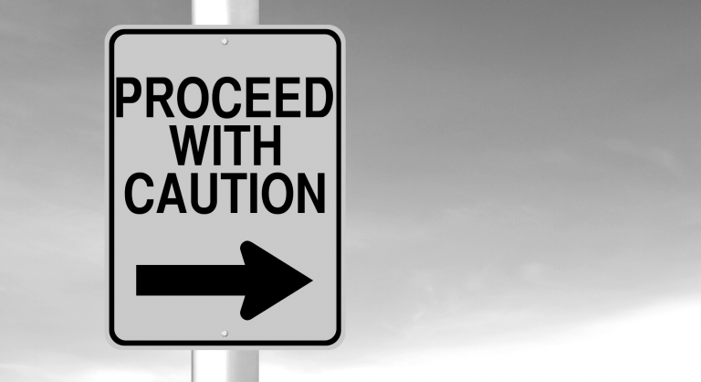 Proceed with caution sign.