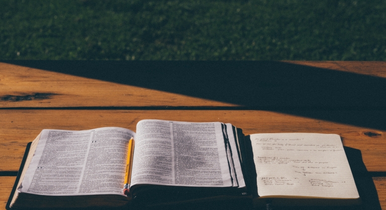 A school book and a notebook.