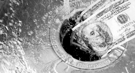 Money getting washed down the drain.