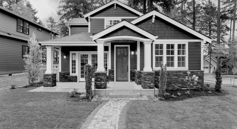 Exterior of a newly built craftsman-style home.