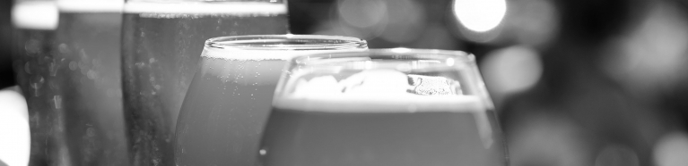 Close-up of various glasses of craft beer.