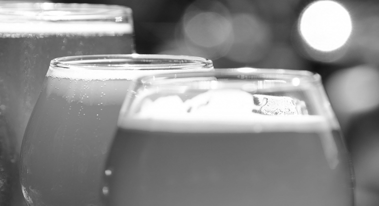 Close-up of various glasses of craft beer.