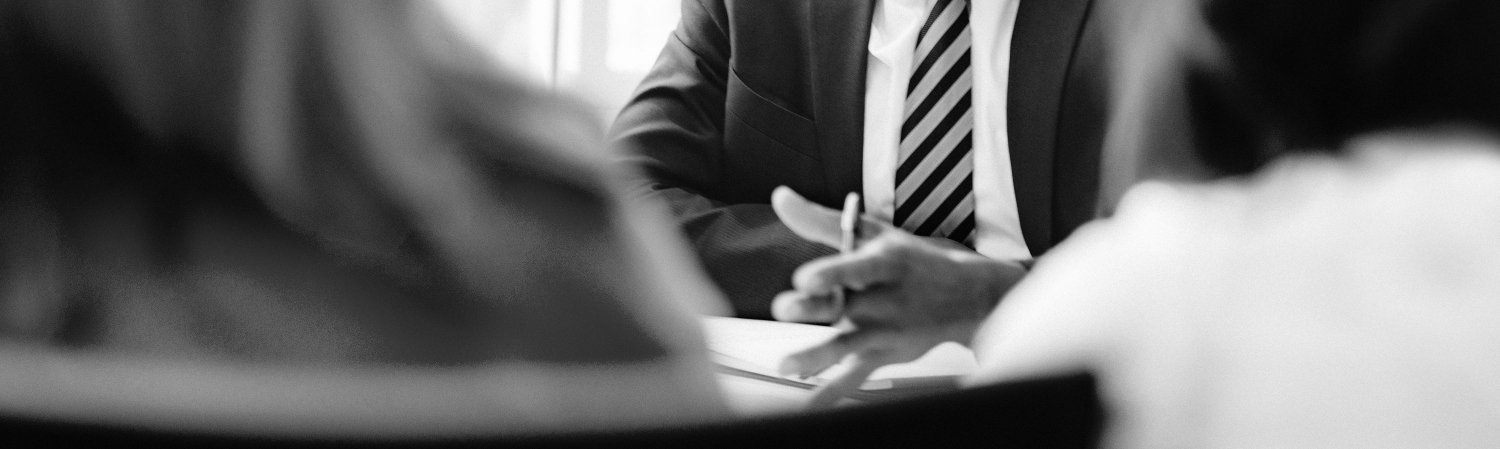 Businessman addressing clients.
