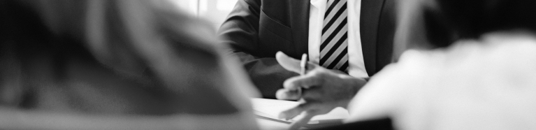 Businessman addressing clients.