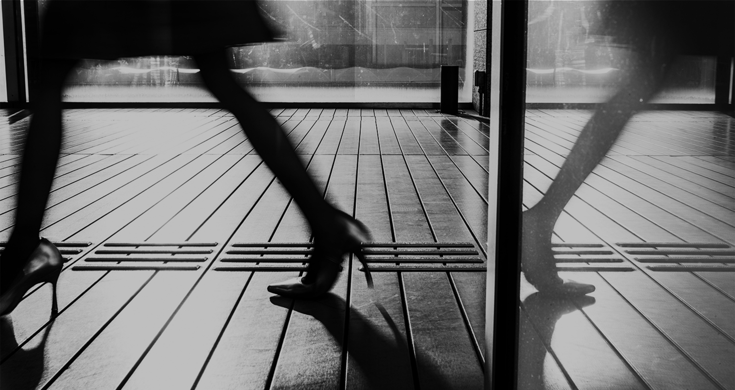 Person in high heels walking.