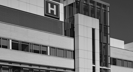 Modern style building with large H sign for hospital.