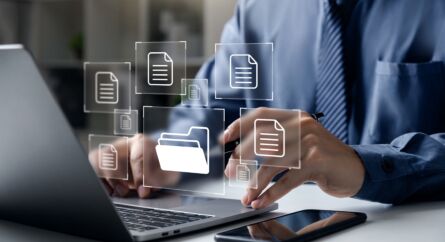Businessman Pointing Folder And Document