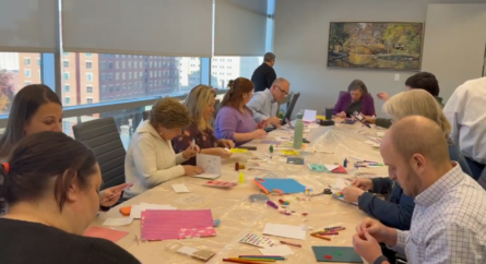 Bowditch team members making birthday cards for Big Brothers Big Sisters of Central Mass & Metrowest